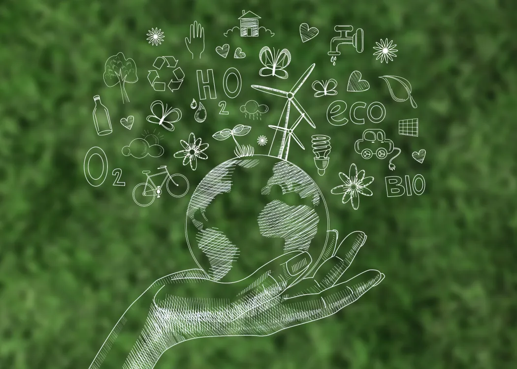 dłoń trzyma kulę ziemską, freepik