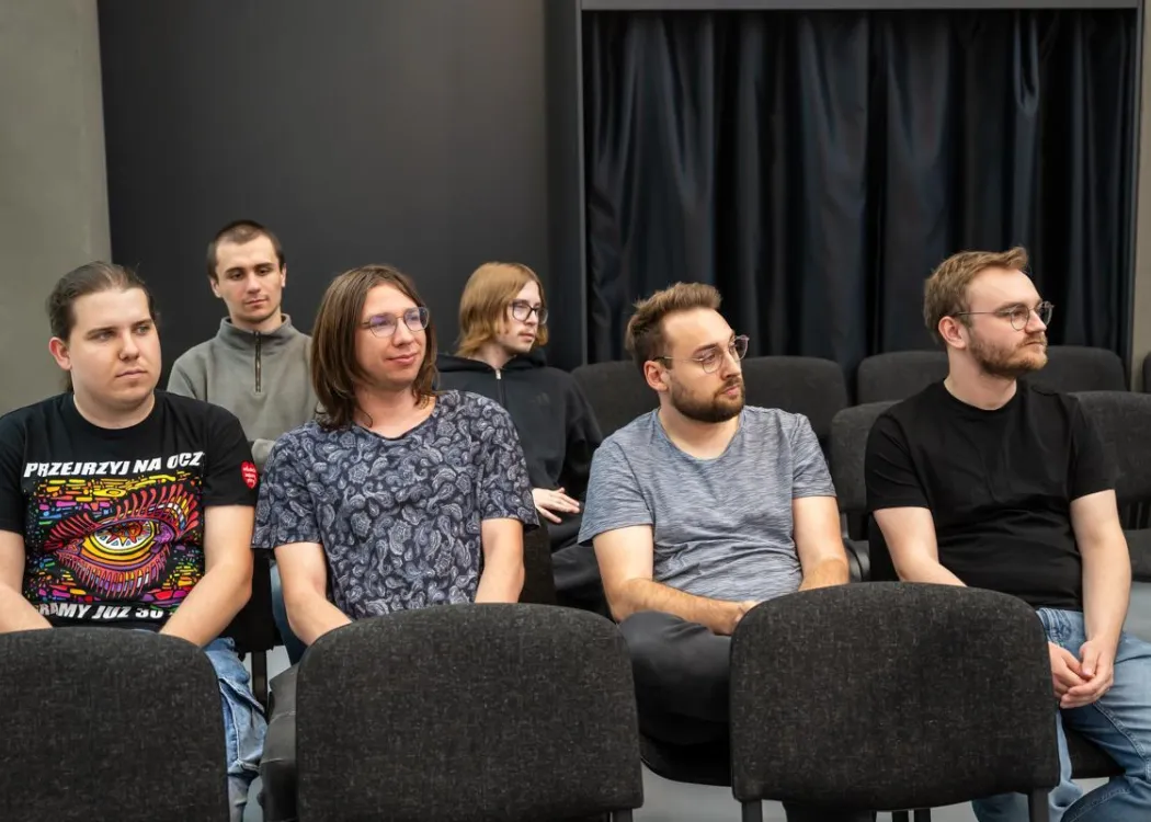 Uczestnicy debaty kopernikańskiej -  słuchacze siedzą 