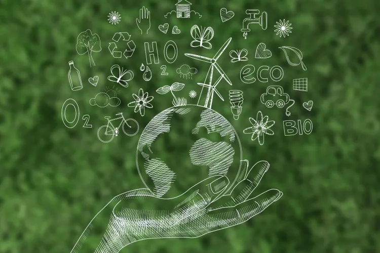 dłoń trzyma kulę ziemską, freepik